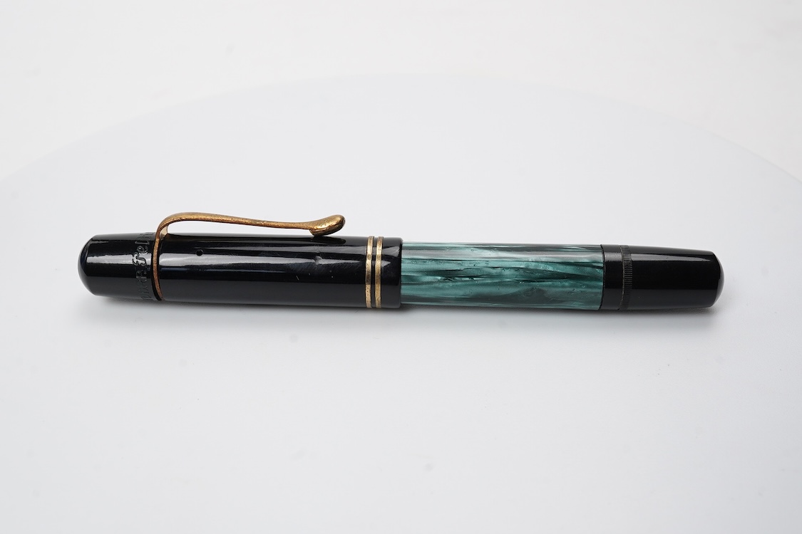 A Pelikan 100N fountain pen fitted with a 14ct. gold Pelkan nib